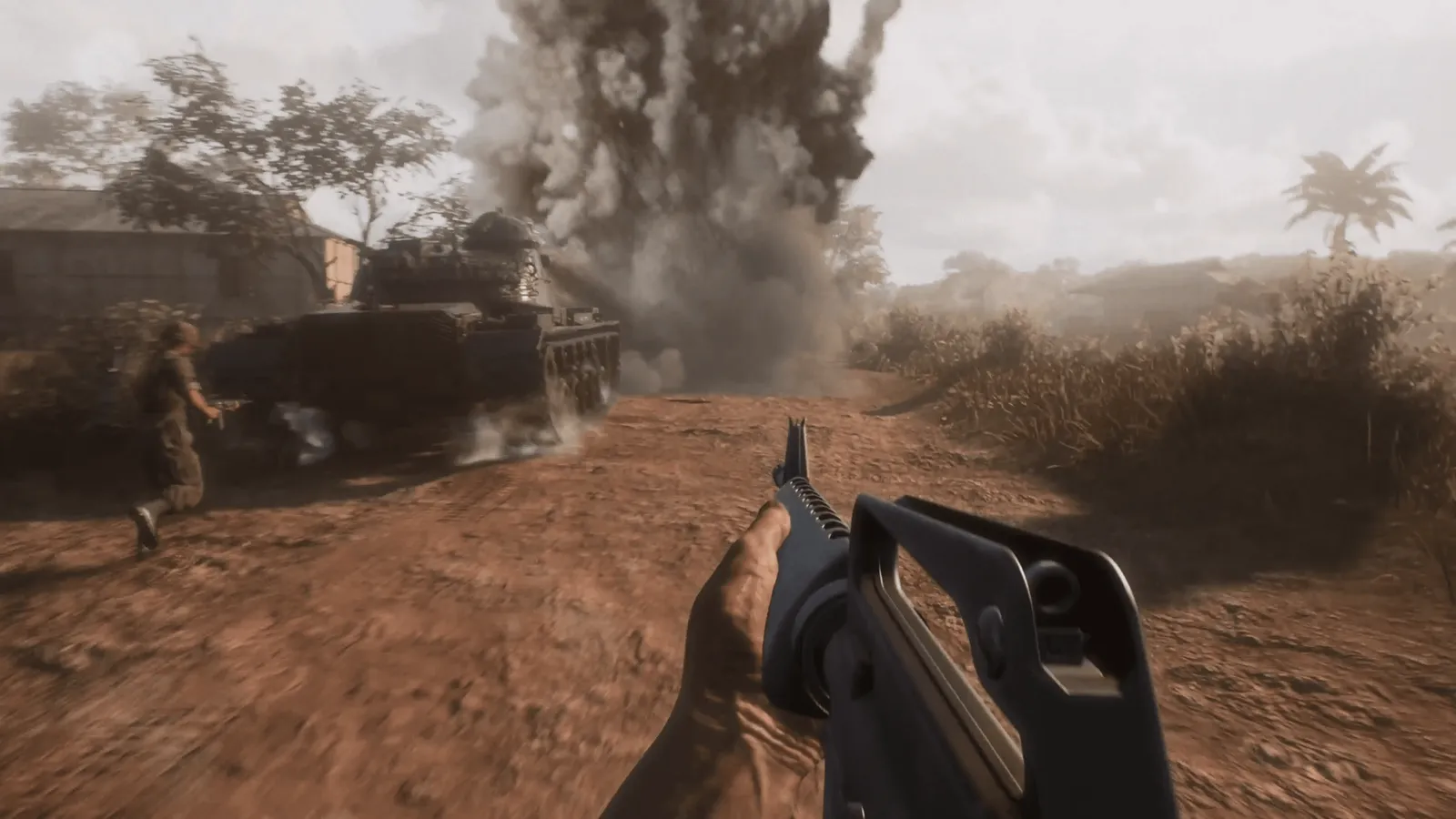 Official HLL: Vietnam media showing a first-person rifle view beside an armoured vehicle and an explosion.